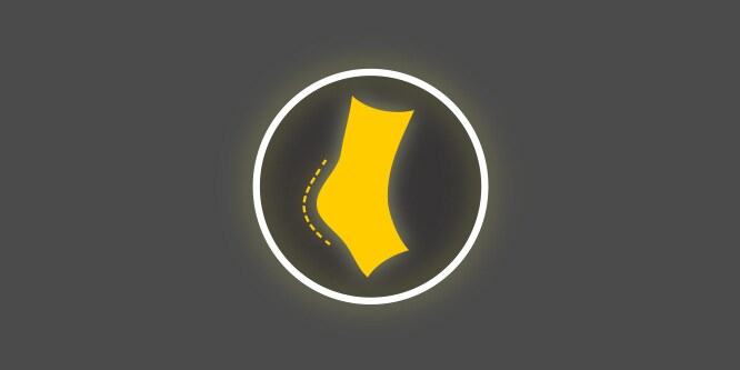 Kelta-valkoinen kuvake, jossa on kantapää ympyrän sisällä, tummanharmaalla taustalla, joka kuvaa vähentynyttä hiertämistä ja hankausta.
